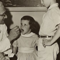 Albert Sabin (left) developed the oral vaccine given to Cleveland children.