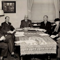 Foundation leaders confer about how to distribute 1947 income of $614,479 to a standing list of charitable institutions and agencies. Foundation director Leyton E. Carter (third from right) is seated next to the board&rsquo;s sole female member, Constance Mather Bishop. 